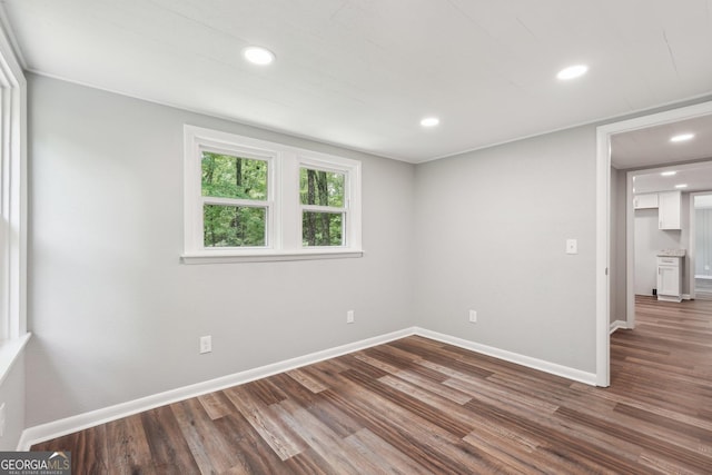 399 N Chestatee St, Dahlonega, GA 30533 - unfurnished room featuring wood finished floors, baseboards, and recessed lighting