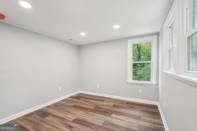 399 N Chestatee St, Dahlonega, GA 30533 - spare room featuring baseboards, dark wood-type flooring, and recessed lighting