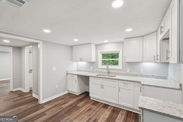 399 N Chestatee St, Dahlonega, GA 30533 - kitchen with a sink, dark wood-type flooring, light stone countertops, white cabinetry, and recessed lighting