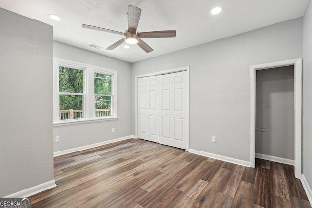 399 N Chestatee St, Dahlonega, GA 30533 - unfurnished bedroom featuring baseboards, wood finished floors, a ceiling fan, recessed lighting, and a closet