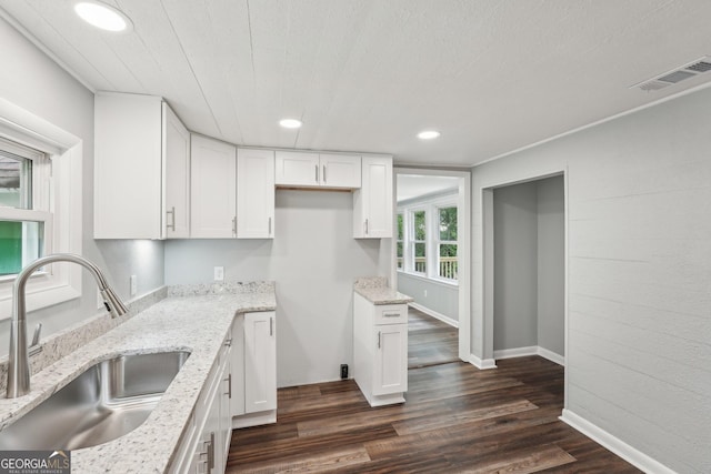 399 N Chestatee St, Dahlonega, GA 30533 - kitchen with a sink, light stone countertops, white cabinetry, dark wood finished floors, and recessed lighting
