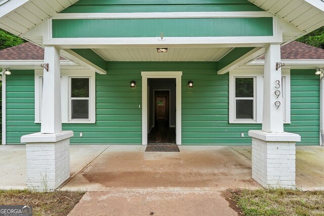 399 N Chestatee St, Dahlonega, GA 30533 - property entrance with a shingled roof