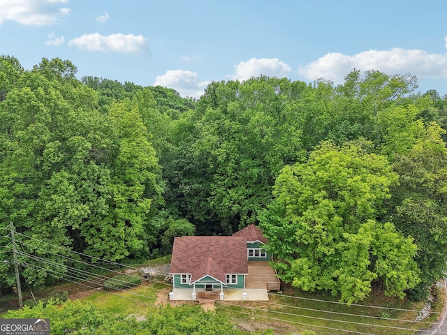 399 N Chestatee St, Dahlonega, GA 30533 - aerial view of property and surrounding area with a heavily wooded area