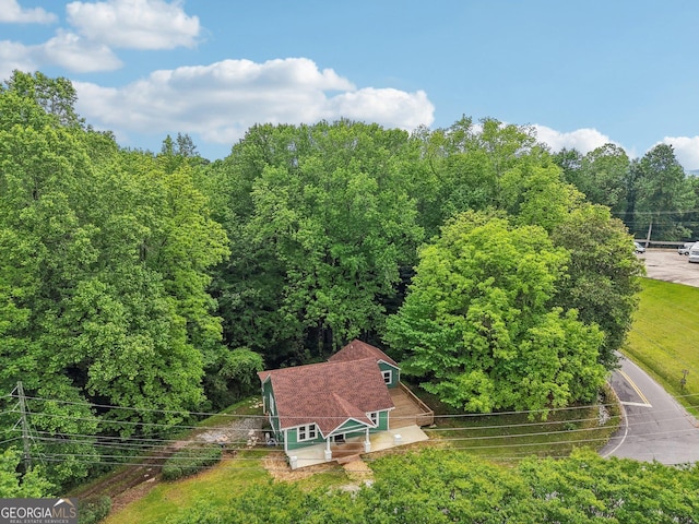 399 N Chestatee St, Dahlonega, GA 30533 - aerial view of property and surrounding area featuring a heavily wooded area