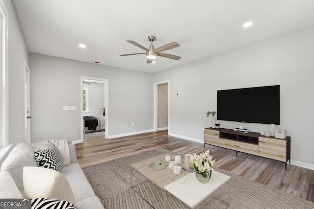 399 N Chestatee St, Dahlonega, GA 30533 - living area with wood finished floors, ceiling fan, baseboards, and recessed lighting