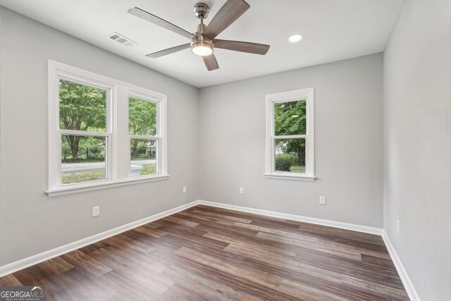399 N Chestatee St, Dahlonega, GA 30533 - unfurnished room featuring healthy amount of natural light, ceiling fan, baseboards, dark wood finished floors, and recessed lighting