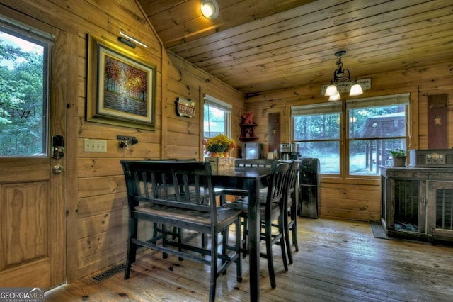 241 Dunn Mill Creek Rd, Blue Ridge, GA 30513 - dining area with wooden ceiling, wooden walls, wood-type flooring, a chandelier, and lofted ceiling