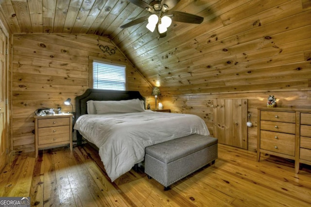 241 Dunn Mill Creek Rd, Blue Ridge, GA 30513 - bedroom featuring vaulted ceiling, light wood-type flooring, wooden walls, and wood ceiling
