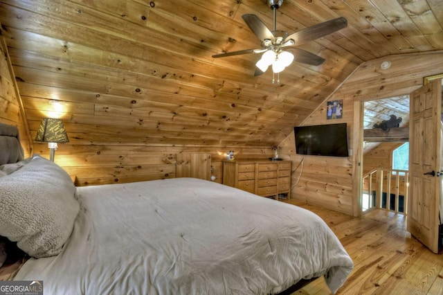 241 Dunn Mill Creek Rd, Blue Ridge, GA 30513 - bedroom featuring lofted ceiling, wooden ceiling, light wood-style floors, and wood walls