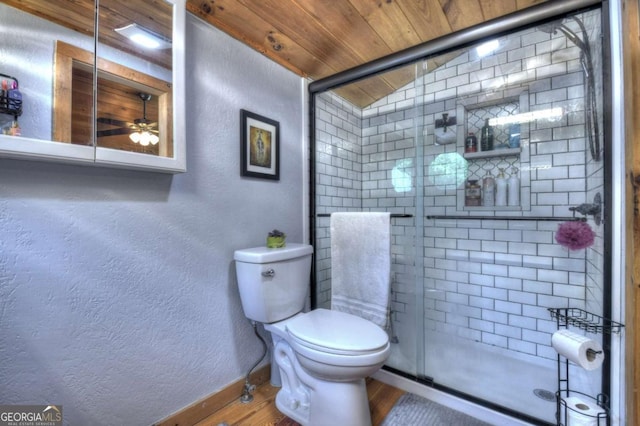 241 Dunn Mill Creek Rd, Blue Ridge, GA 30513 - bathroom with a stall shower, wood finished floors, a textured wall, ceiling fan, and wood ceiling