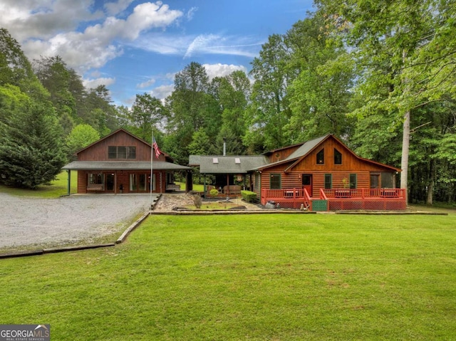 241 Dunn Mill Creek Rd, Blue Ridge, GA 30513 - view of front of home with gravel driveway, a front yard, and a porch