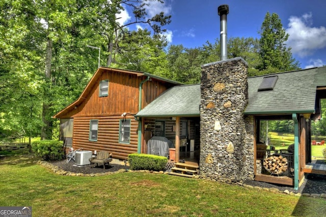 241 Dunn Mill Creek Rd, Blue Ridge, GA 30513 - back of property featuring a lawn and a shingled roof