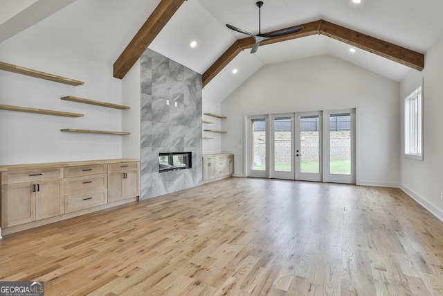 1240 Hayes Sq, Peachtree City, GA 30269 - unfurnished living room with a ceiling fan, high vaulted ceiling, a fireplace, recessed lighting, and beamed ceiling