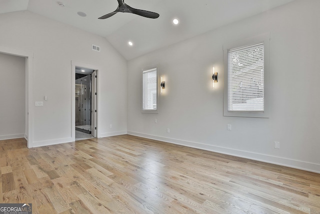 1240 Hayes Sq, Peachtree City, GA 30269 - unfurnished bedroom with lofted ceiling, multiple windows, light wood-style flooring, ensuite bathroom, and baseboards