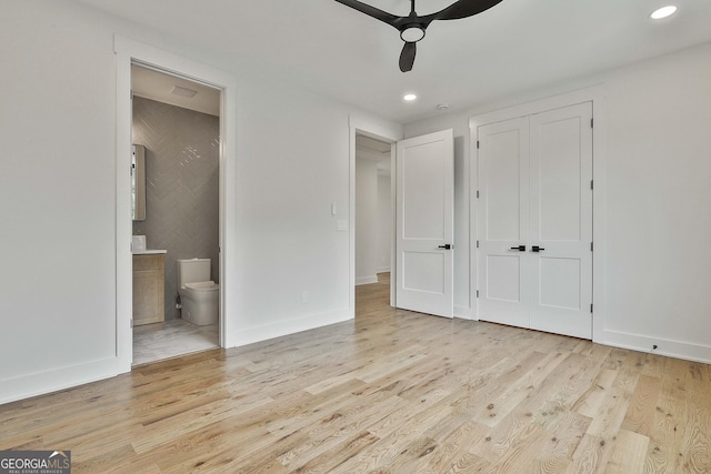 1240 Hayes Sq, Peachtree City, GA 30269 - unfurnished bedroom featuring wood finished floors, recessed lighting, connected bathroom, and baseboards