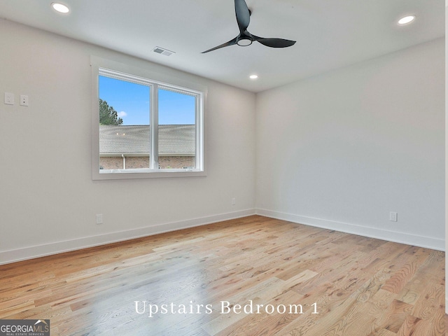 1240 Hayes Sq, Peachtree City, GA 30269 - empty room with wood finished floors, a ceiling fan, baseboards, and recessed lighting
