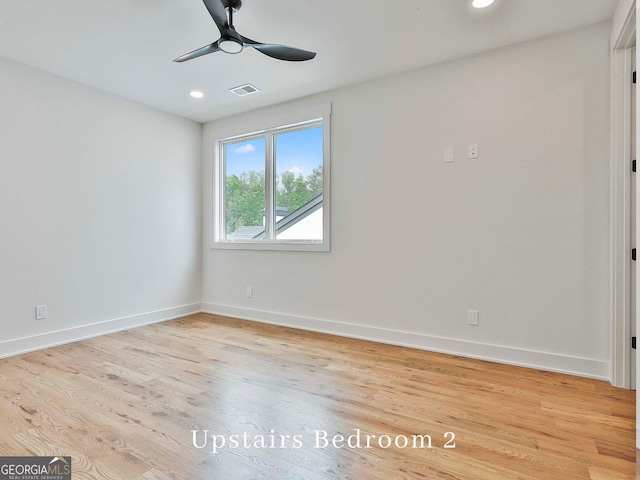 1240 Hayes Sq, Peachtree City, GA 30269 - spare room with a ceiling fan, baseboards, light wood-style flooring, and recessed lighting