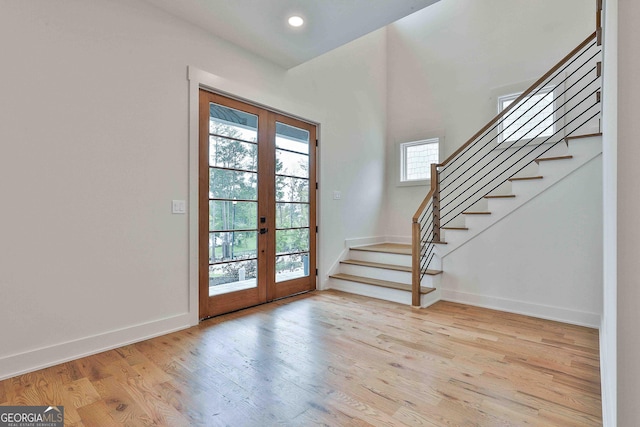 1240 Hayes Sq, Peachtree City, GA 30269 - entryway featuring french doors, stairway, light wood-style floors, baseboards, and recessed lighting