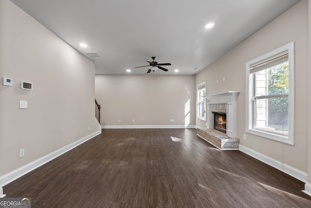 475 Louise Way, Locust Grove, GA 30248 - unfurnished living room featuring dark wood finished floors, a ceiling fan, recessed lighting, a fireplace, and baseboards