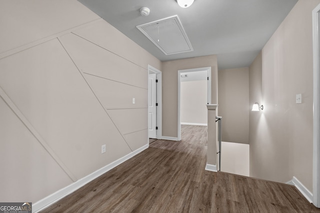 475 Louise Way, Locust Grove, GA 30248 - unfurnished room with attic access, baseboards, wood finished floors, and a smoke detector
