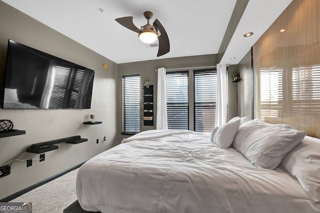 898 Oak St SW Unit 3204, Atlanta, GA 30310 - carpeted bedroom with multiple windows, a ceiling fan, and baseboards