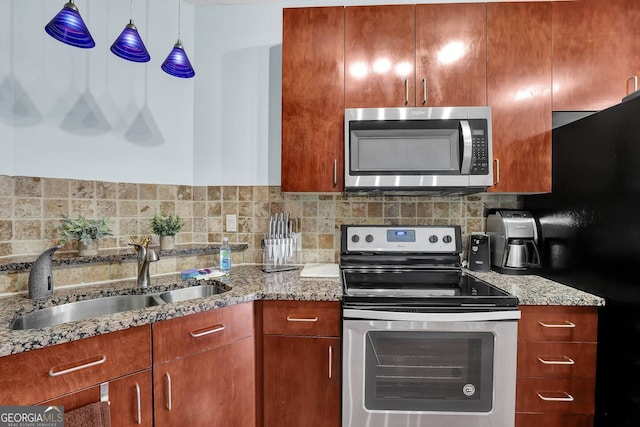 898 Oak St SW Unit 3204, Atlanta, GA 30310 - kitchen featuring appliances with stainless steel finishes, a sink, light stone countertops, and tasteful backsplash