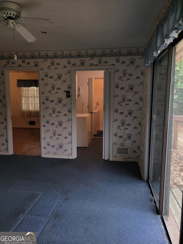 2137 Plantation Ln, Chamblee, GA 30341 - spare room featuring wallpapered walls and ceiling fan