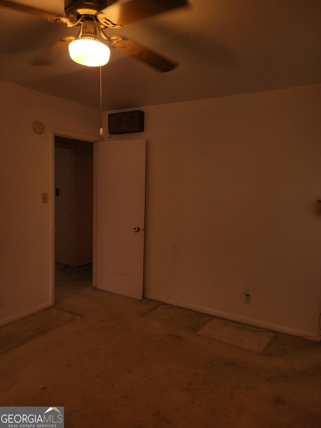 2137 Plantation Ln, Chamblee, GA 30341 - empty room featuring light colored carpet, ceiling fan, baseboards, and a smoke detector