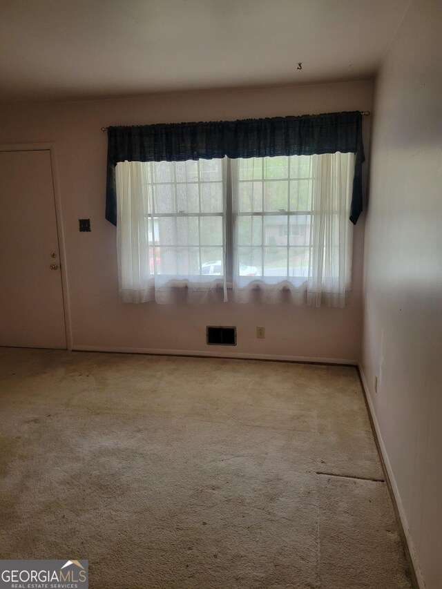 2137 Plantation Ln, Chamblee, GA 30341 - carpeted empty room with baseboards