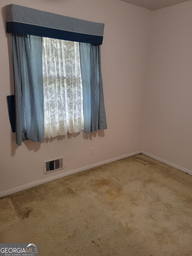 2137 Plantation Ln, Chamblee, GA 30341 - carpeted empty room with baseboards