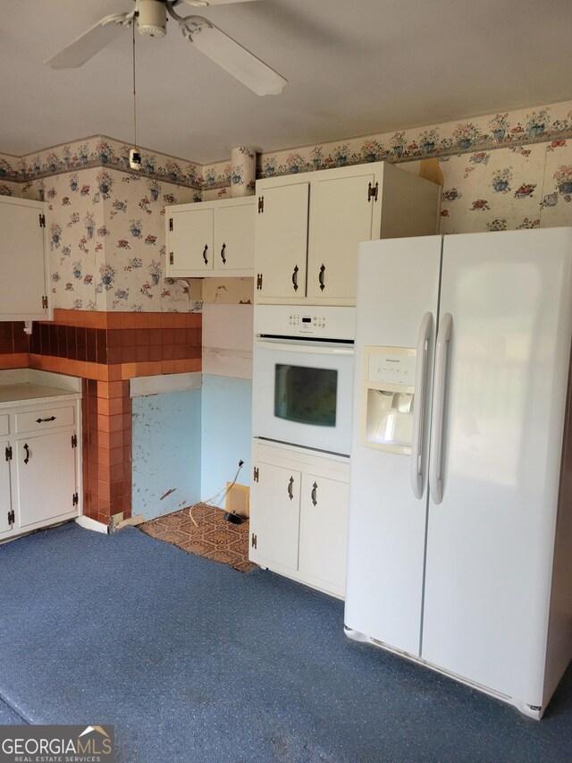 2137 Plantation Ln, Chamblee, GA 30341 - kitchen featuring white appliances, wallpapered walls, a ceiling fan, and white cabinets