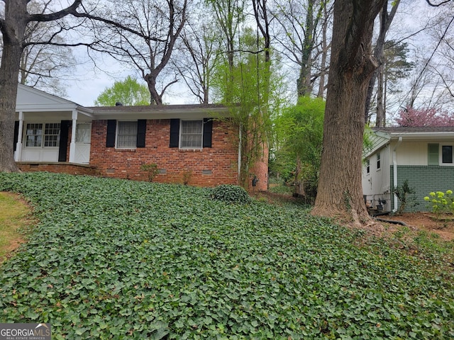 2137 Plantation Ln, Chamblee, GA 30341 - view of front of home with brick siding and crawl space