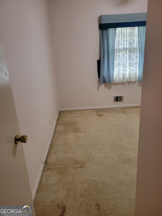 2137 Plantation Ln, Chamblee, GA 30341 - empty room with carpet flooring and baseboards