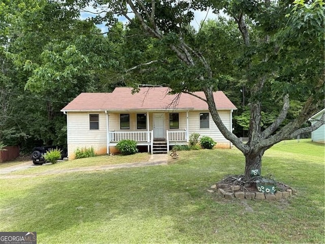 285 Woodland St, Dallas, GA 30157 - view of front of property with a porch and a front lawn
