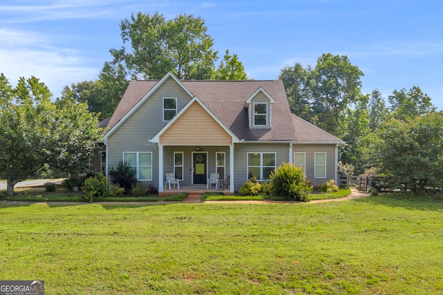 152 Charity Dr, Homer, GA 30547 - view of front of house with covered porch, a front lawn, and roof with shingles