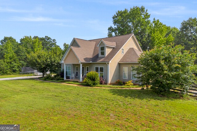 152 Charity Dr, Homer, GA 30547 - view of front of property featuring a front lawn, covered porch, and roof with shingles