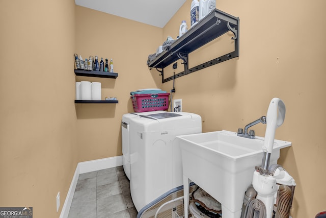 152 Charity Dr, Homer, GA 30547 - washroom with washer and clothes dryer and baseboards