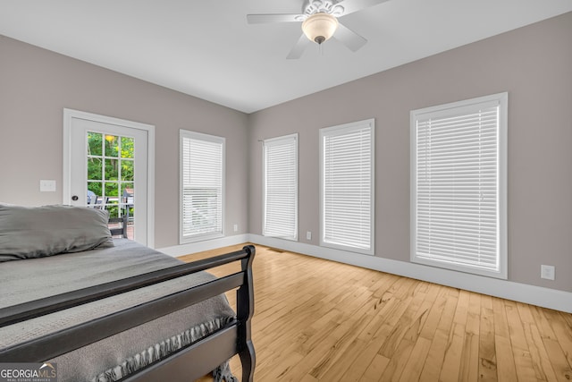 152 Charity Dr, Homer, GA 30547 - bedroom featuring baseboards, light wood finished floors, access to outside, and ceiling fan