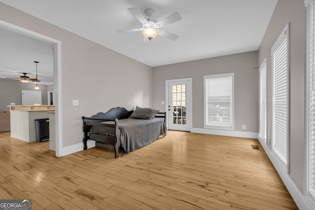 152 Charity Dr, Homer, GA 30547 - bedroom with light wood-type flooring, baseboards, and ceiling fan