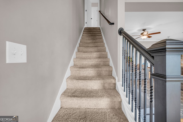 152 Charity Dr, Homer, GA 30547 - stairs with ceiling fan and baseboards