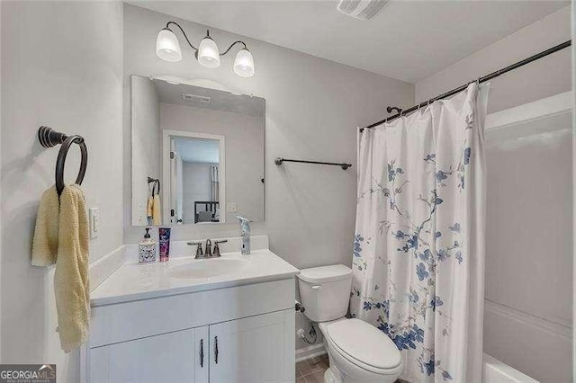 204 Starwood Ct, Acworth, GA 30102 - full bathroom with vanity, toilet, and shower / bath combination with curtain