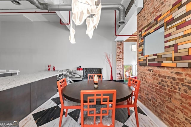 87 Peachtree St SW Unit 209, Atlanta, GA 30303 - dining room featuring brick wall