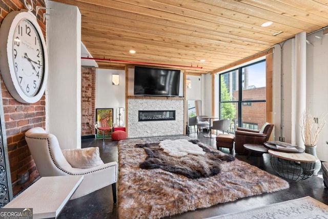 87 Peachtree St SW Unit 209, Atlanta, GA 30303 - living area featuring wooden ceiling, a glass covered fireplace, recessed lighting, and brick wall