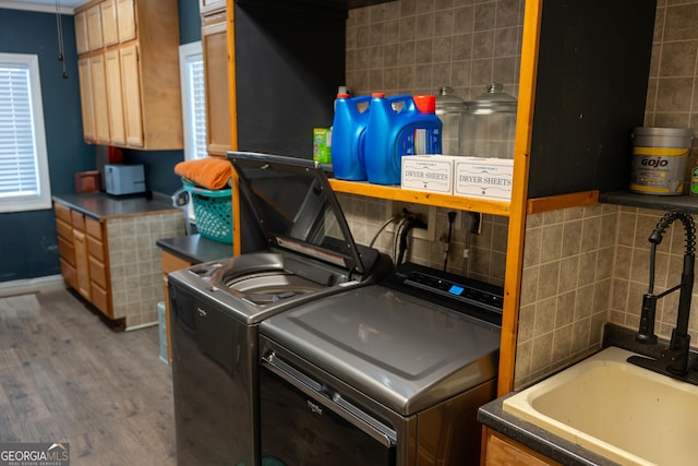 4076 Airline Rd, Mcdonough, GA 30252 - laundry area featuring washing machine and dryer and wood finished floors
