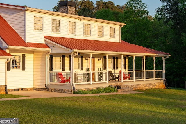 4076 Airline Rd, Mcdonough, GA 30252 - view of front facade featuring covered porch, a front lawn, metal roof, and a chimney