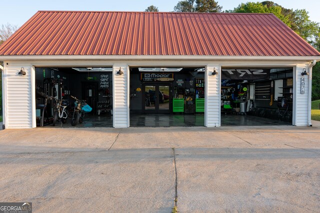 4076 Airline Rd, Mcdonough, GA 30252 - view of building exterior featuring a detached garage