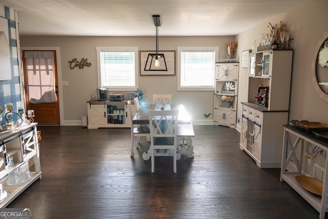 4076 Airline Rd, Mcdonough, GA 30252 - dining space featuring healthy amount of natural light, dark wood-style flooring, and baseboards