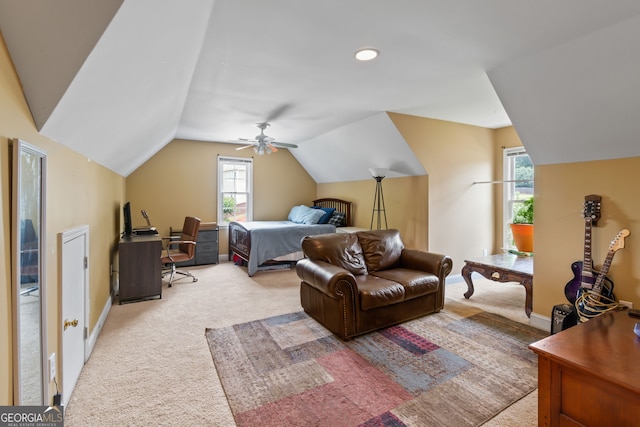 635 Piping Rock Pt, Lawrenceville, GA 30043 - bedroom with light colored carpet, vaulted ceiling, multiple windows, a ceiling fan, and baseboards