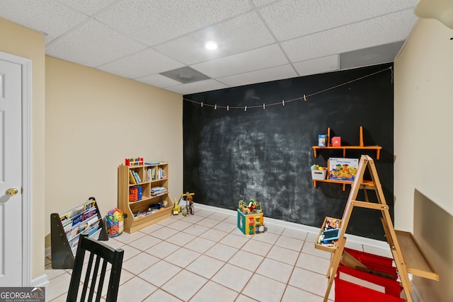 635 Piping Rock Pt, Lawrenceville, GA 30043 - rec room featuring a paneled ceiling, baseboards, and tile patterned flooring