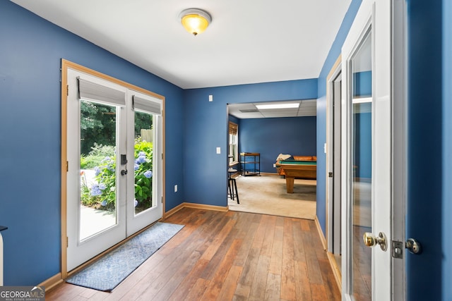635 Piping Rock Pt, Lawrenceville, GA 30043 - doorway featuring french doors, billiards table, baseboards, and hardwood / wood-style flooring
